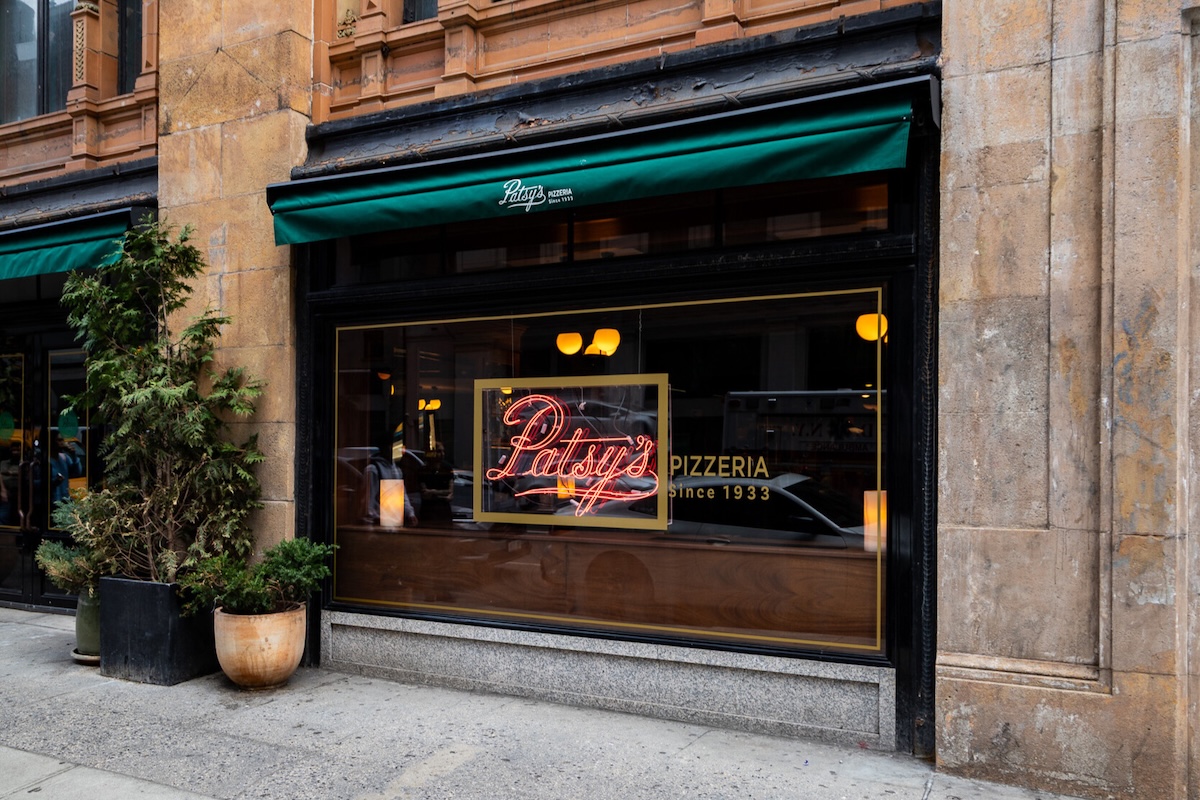 This photo shows the exterior of Patsy's Pizzeria at Freehand New York.