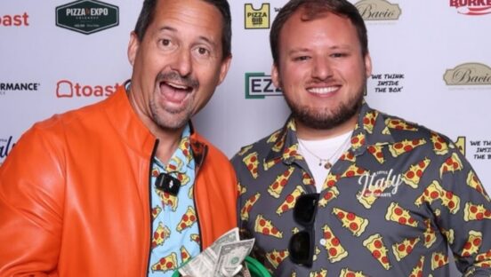 This photo shows Matt Plapp, pulling cash money out of a plastic bowl, and smiling for the camera with Avery Ward of Little Italy Ristorante.