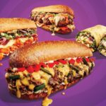 This photo shows various menu items that are described in the article itself, including the Beer Cheese Philly, the Meatball Parmesan and the Pesto Chicken sandwiches in the foreground, and two wraps in the background.