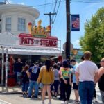 This photo shows a line of customers outside Pat's King of Steaks in Philadelphia.