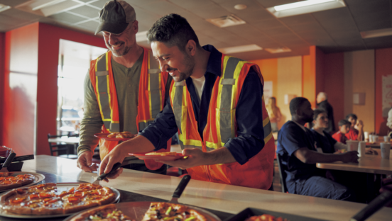 Customers eat at Cicis Pizza's buffet.