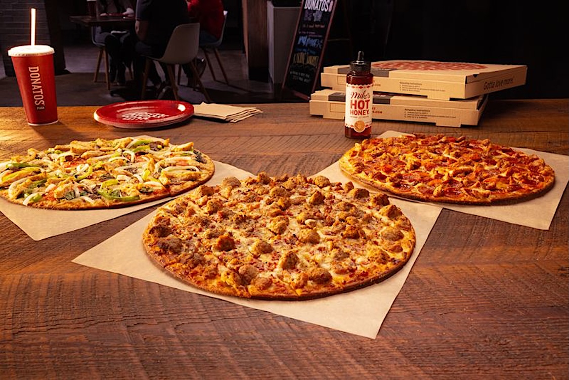 This photo shows the three pizzas described in the article.