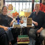 This photo shows the woman who owns the pizzeria sitting in a second-hand shop with Rudy Waldner.
