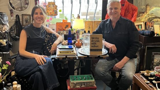 This photo shows the woman who owns the pizzeria sitting in a second-hand shop with Rudy Waldner.
