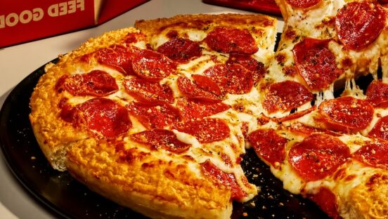 This photo shows Pizza Hut's new Crispy Parm Pan Pizza topped with pepperoni.