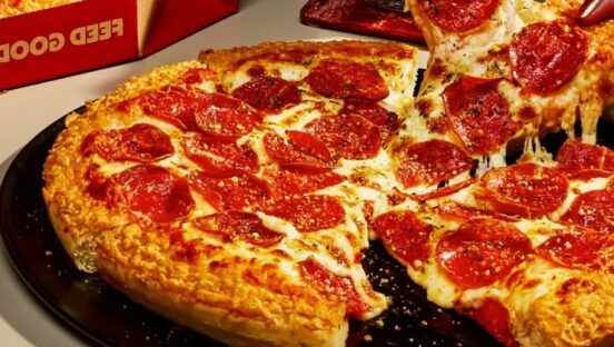 This photo shows Pizza Hut's new Crispy Parm Pan Pizza topped with pepperoni.