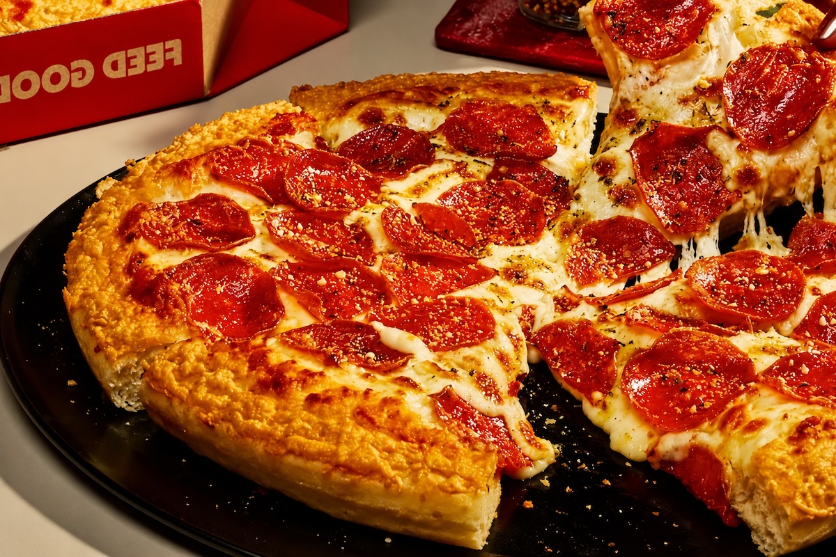 This photo shows Pizza Hut's new Crispy Parm Pan Pizza topped with pepperoni.