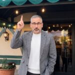 This photo shows Steve Carell pointing to the green exterior awning at Barone's.