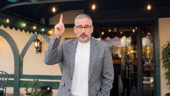 This photo shows Steve Carell pointing to the green exterior awning at Barone's.