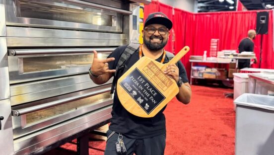 This photo shows Juan Robles holding one of his trophy peels after winning the California Pizza Challenge last year.