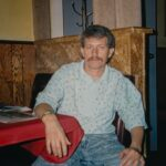 This photo shows Tony Fanara in the late 1970s, sitting at a booth in his pizzeria.