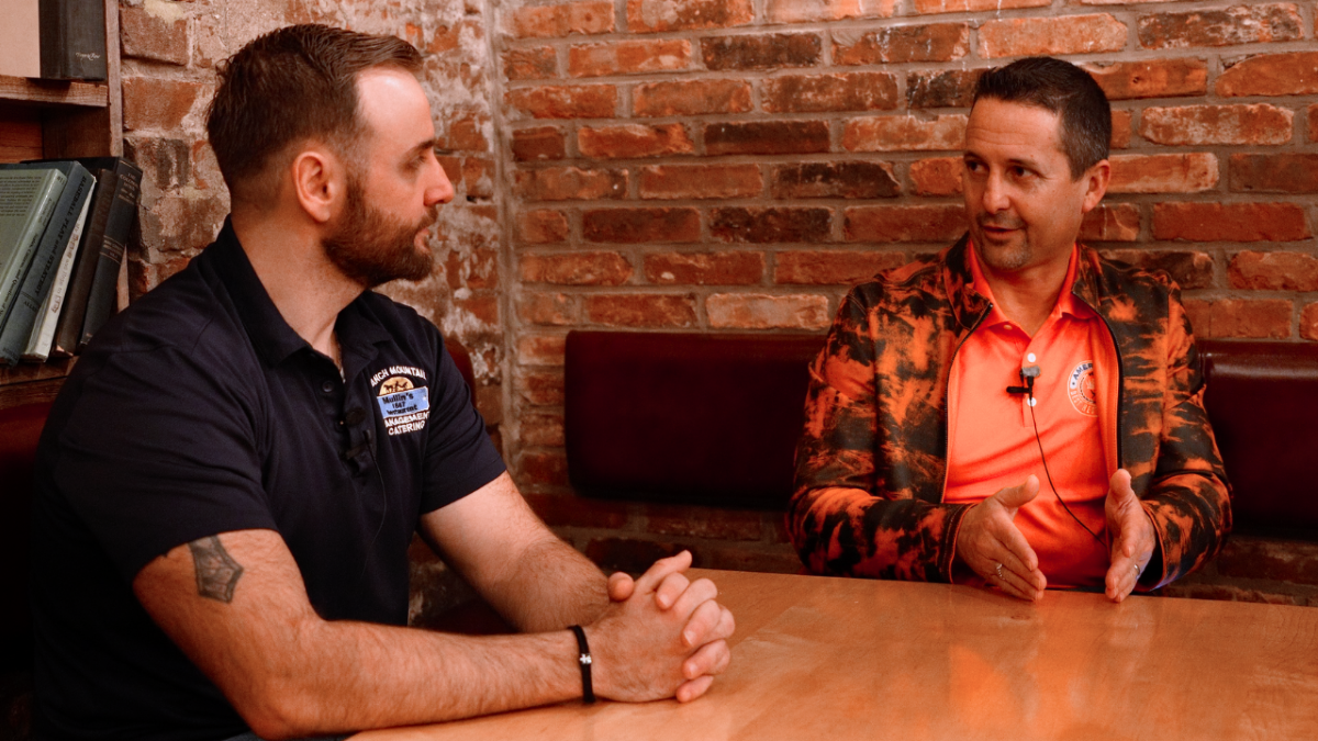 Matt Plapp of America's Best Restaurants talks with a restaurant owner