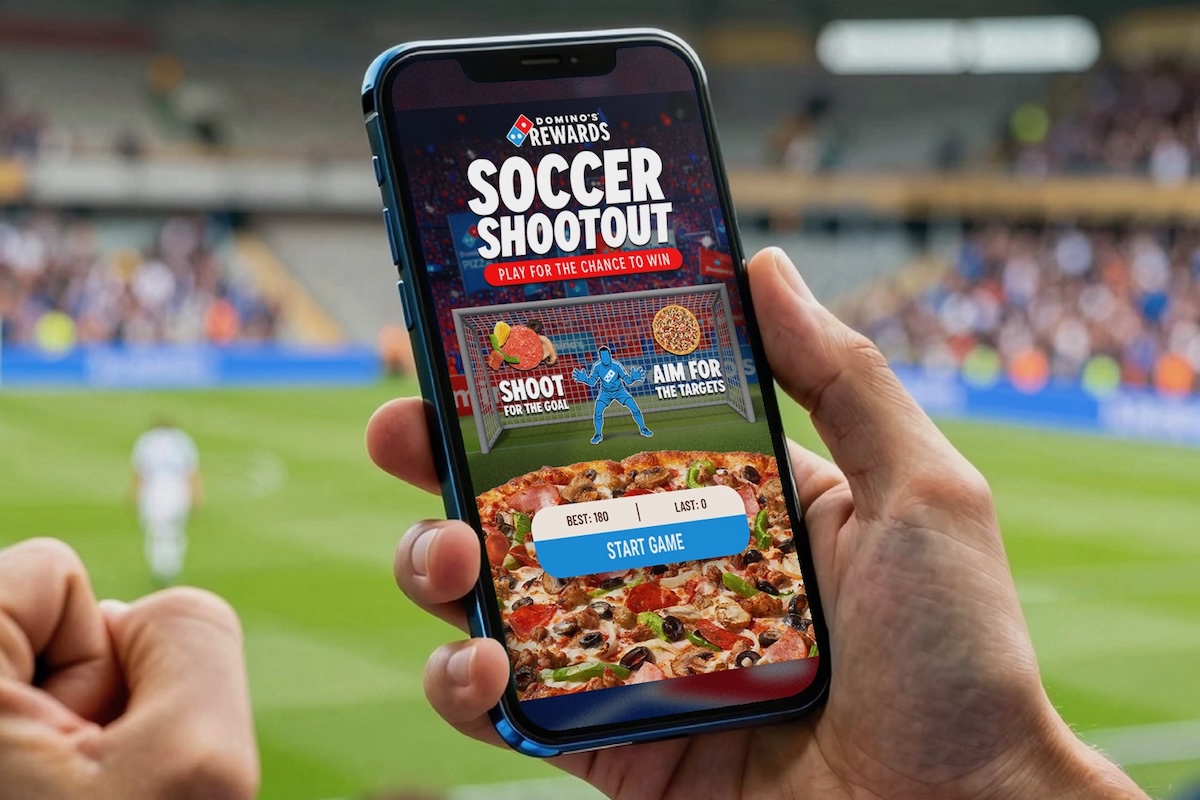 This photo shows Domino's Soccer Shootout in-app game on the screen of a smartphone.