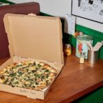 A pizza on the table at Bucky's Pizza in Chatham, New Jersey
