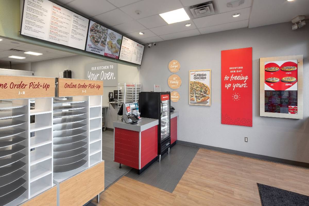 This photo shows the interior of a redesigned Papa Murphy's location with no people visible in the photo.