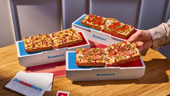 This photo shows several different variations of the Domino single-serve pizza.