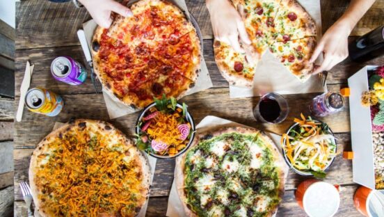 Timber Pizza Co. pizzas on a table
