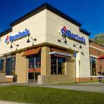 This photo shows the exterior of a Domino's location in Lansing, Michigan.