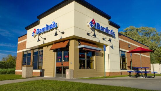This photo shows the exterior of a Domino's location in Lansing, Michigan.