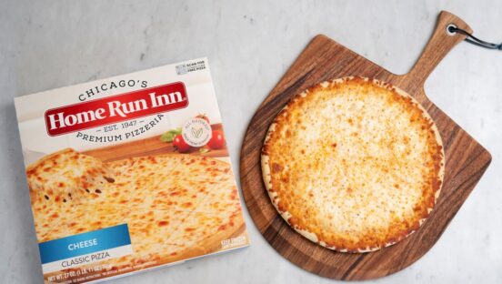 Home Run Inn frozen pizza on a peel